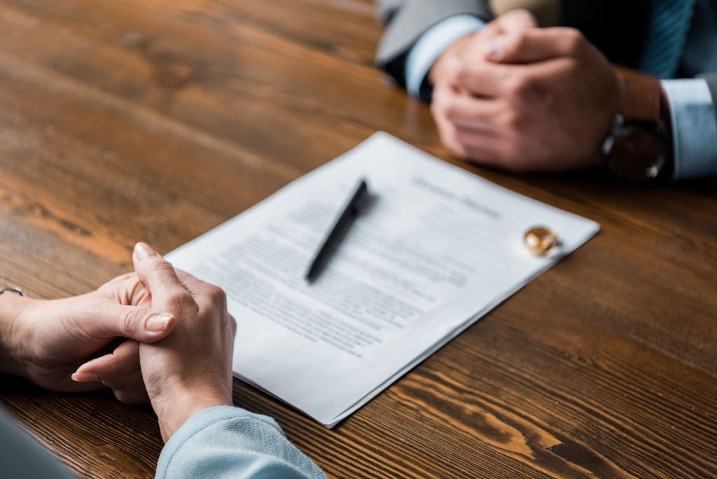 Lawyer Discussing With His Client